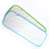 A bamboo insert with green binding and a cotton insert with blue binding.