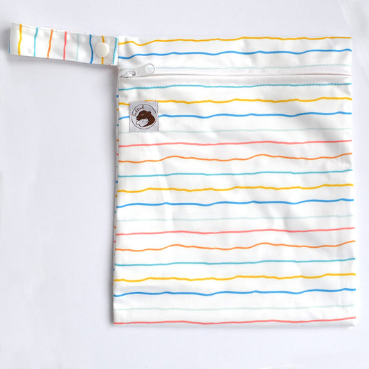 a white small wetbag with colourful stripes