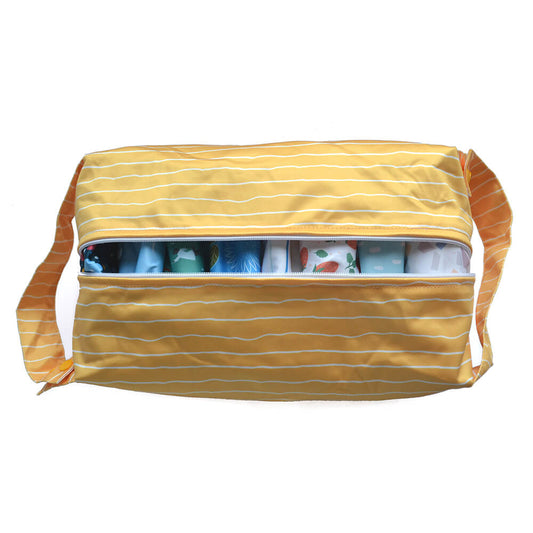 A yellow nappy pod with white stripes. Inside are 8 cloth nappies.