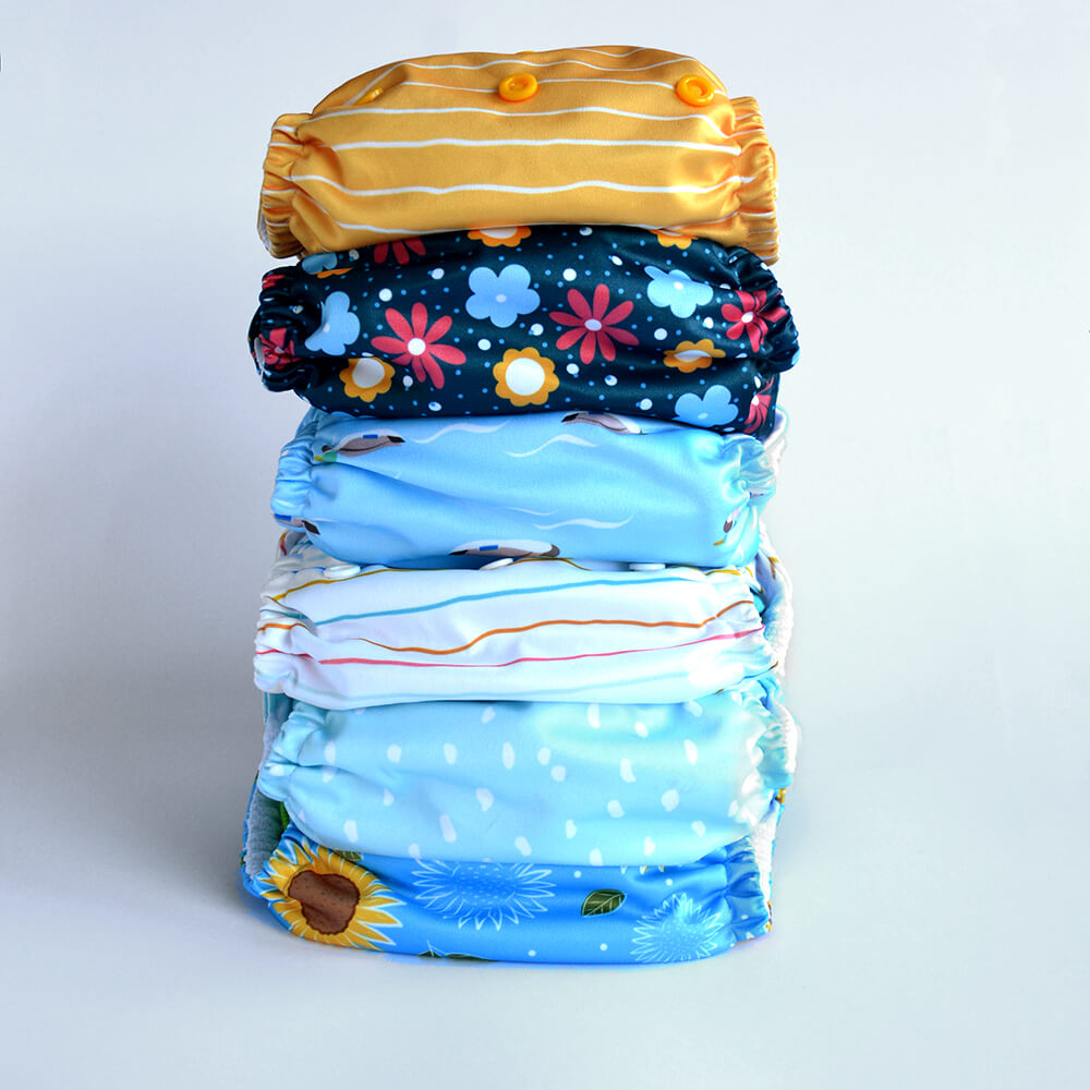 Stack of 6 reusable cloth nappies